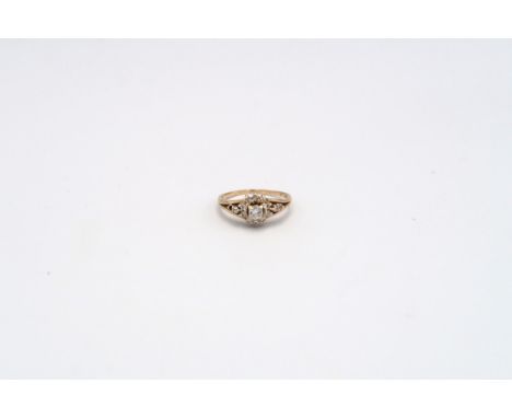 A diamond cluster ring. Estimated total diamond weight 0.50ct. One diamond missing. Stamped 14K. Ring size P. Weight approx 3