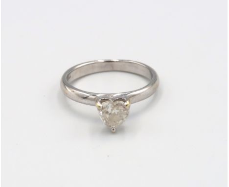 An 18ct white gold ring with heart shaped diamond estimated 0.70ct, I/J 1/2, size M 1/2, approx 3.17 grams 