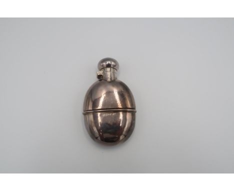 A hallmarked silver oval hip flask, Birmingham 1906, 2.29 troy oz 