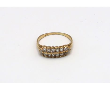 An 18ct yellow gold two row diamond ring, approx 2.5 grams, size N 