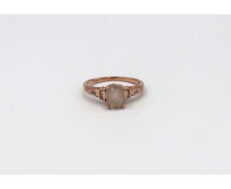 A 9ct Rose Gold diamond dress ring. Size O, approx weight 2.2 grams