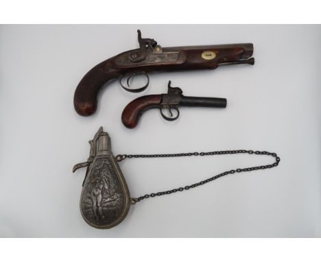 A Percussion pistol - double lock system to the hammer, working order with barrel reloading rod for a quick reload, engraved 