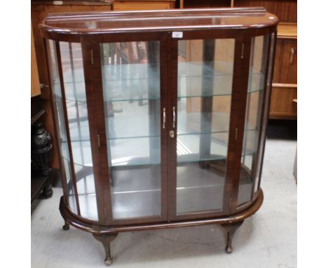 A sapele mahogany bow-front display cabinet with adjustable glass shelves over short cabriole legs, height 118cm.