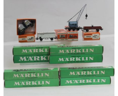 A collection of Marklin model railway items to include railway carriage numbered 4037, railway carriage 4022, 4023, two boxed