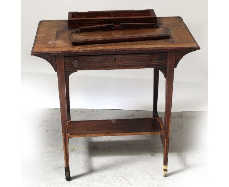 An Edwardian rosewood bonheur du jour with elevated stationery compartment and writing surface (lacking leather), surmounting