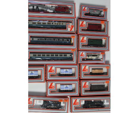 A collection of Lima Models OO gauge model railway vehicles to include locomotive in black livery, railway crane, three Inter