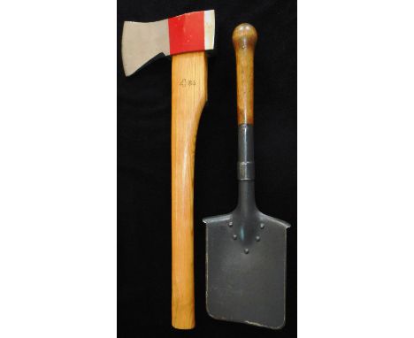 A large Swiss army issue axe with entrenching tool, no cover.