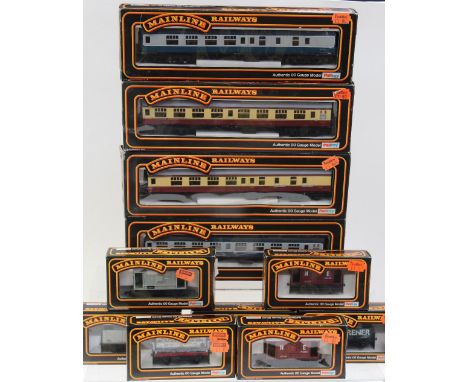 A collection of Mainline Railways OO gauge model railway carriages and rolling stock to include a BR SK Coach Cream/Crimson S