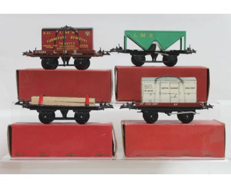 A Hornby Trains 'Number 50 Low-Sided Wagon with Insulated Meat Container' gauge 0, a 'Number 1 Timber Wagon', a hopper wagon 