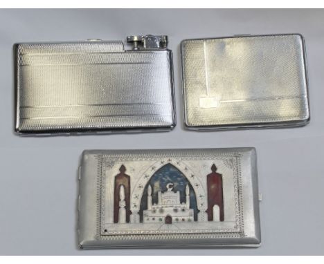 A WWII period cigarette case decorated to one side with mosque with crescent and to the other with a map of Africa, an early/