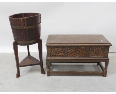 A small oak reproduction plank chest on frame base, width 66cm and a coopered oak planter on tripartite base united by triang