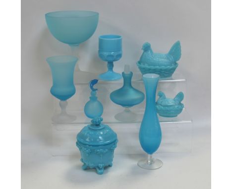 A quantity of vintage c1960s turquoise glassware to include a large decorative goblet, a rose vase, trinket pots with cover, 