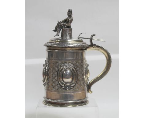 A Victorian Russian hallmarked silver gilt tankard, gilded lattice work to the body with three vacant raised oval cartouches 