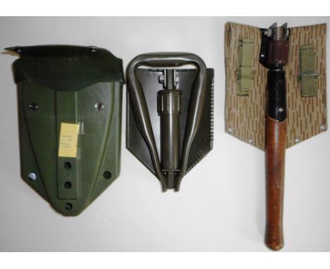 A West German Army entrenching tool, and an East German model, both with covers (2).
