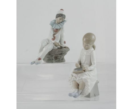 Two Nao figures, a girl with a chalkboard and a seated Pierrot (2).