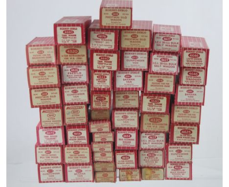 A large collection of Hornby Dublo model railway rolling stock and accessories to include 4320 Six-Ton Refrigerator Van W.R. 