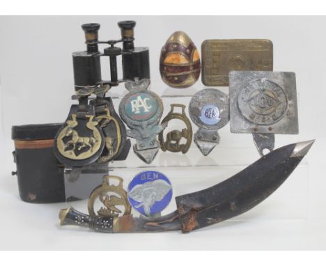A cased pair of WWII military binoculars, a WWI Princess Mary Christmas tin 1914-18, three metal badges, an RAC Motor Sport m