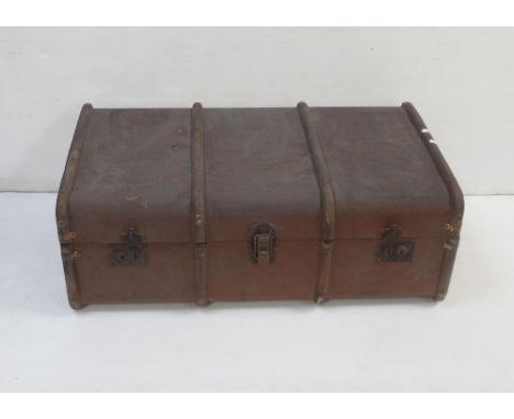 A late 19th/early 20th century travel trunk with bamboo laths and small label.