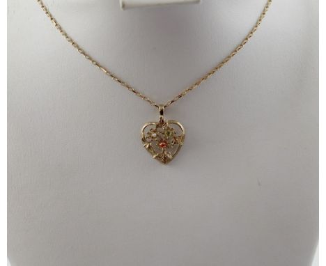 A 9ct yellow gold open heart pendant, floral-set with small fire opal, peridot and a seed pearl on a 9ct gold link chain, app