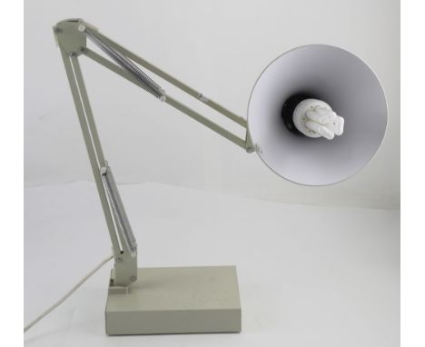 An Anglepoise-style table lamp on rectangular base.