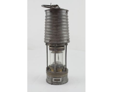 A vintage Patterson miners' lamp type HCP, height 31cm. CONDITION REPORT There is a notch to the base but no evidence it has 