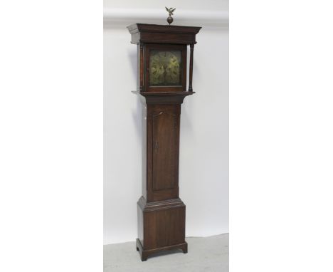 A Stevenson of Congleton twin-train brass dial oak longcase cloak, the dial set with Roman numerals and rolling date chapter,