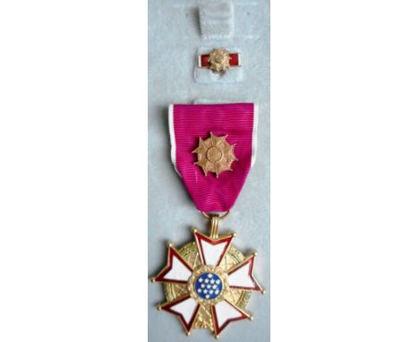 An American Silver Star decoration, in original box of issue, with medal ribbon bar and miniature bar, Inscribed 'For Gallant