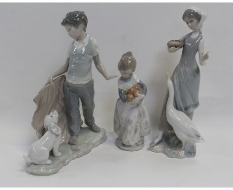 Two Lladró figures, one of a goose girl the other a young girl with basket of oranges and a Nao figure of a boy playing with 