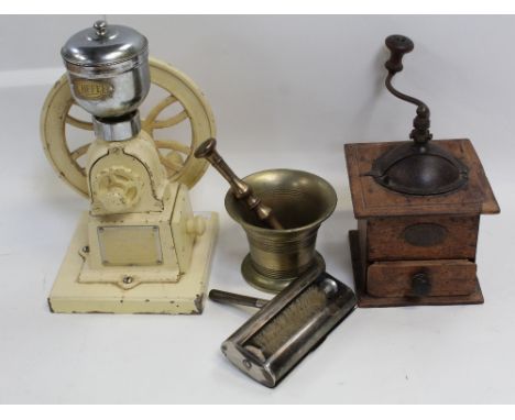 A cast iron Birchleaf coffee grinder with flywheel, a wooden-cased Japy Frères et Cie coffee grinder, a brass pestle and mort