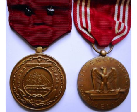 Two American Good Conduct medals, army issue 1941 with ribbon bar, Navy issue 1884 with two stars (2). CONDITION REPORT Very 