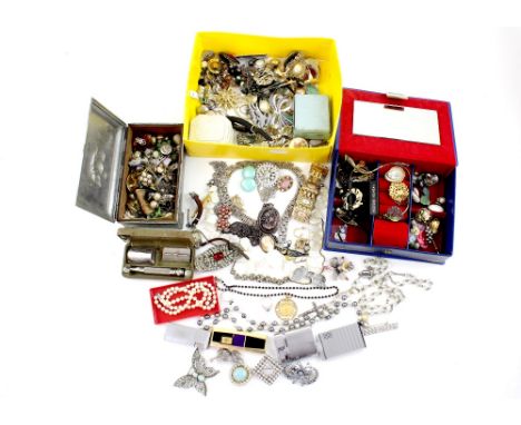 A large quantity of costume jewellery, some contained in jewellery boxes, to include necklaces, brooches, earrings, chains, p