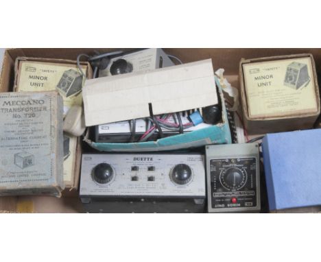 A collection of model railway power units to include a Hammant &amp; Morgan Minor Unit, Hornby OO Controller, Meccano Transfo