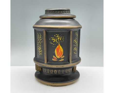 This fun cookie jar is in the shape of a lantern with hand painted flames. Marked McCoy. Issued: 1963Dimensions: 7"L x 7"W x 