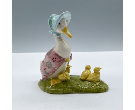 Glossy porcelain. Features the duck character in a blue bonnet and pink shawl, accompanied by her yellow little ducks. This i