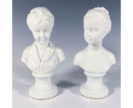 A stunning pair of white bisque porcelain busts of a boy and girl atop a glossy footed base. Largest bust: 4"L x 2.75"W x 7.7