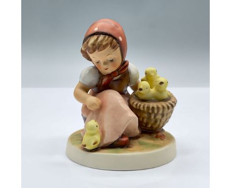 This endearing porcelain figure features a girl with a basket. Marked Goebel 57/I. Issued: 20th centuryDimensions: 3.5"L x 3.