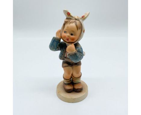This auction lot features a charming vintage porcelain figurine titled "Boy with Toothache" by W. Goebel, crafted in Western 