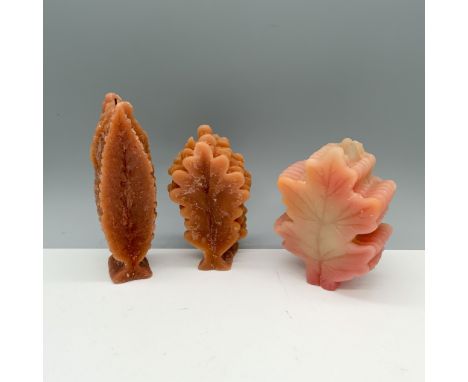 Fun collection of wax sculptures shaped into different styles of foliage. Largest item measures 2"L x 2"W x 7"H. Issued: 21st