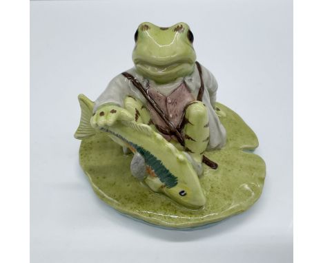 Glossy porcelain. Features the beloved frog character in a dynamic scene with a green fish, sitting on a leaf. Beswick Beatri
