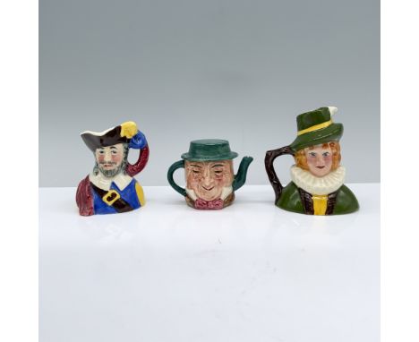 A set featuring a Spanish soldier in blue and yellow, an Irishman in a leprechaun outfit, and a teapot with a mad hatter-like