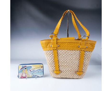 A stylish pair of Brighton bags, showcasing the brand's signature attention to detail and artistic flair. This set includes: 