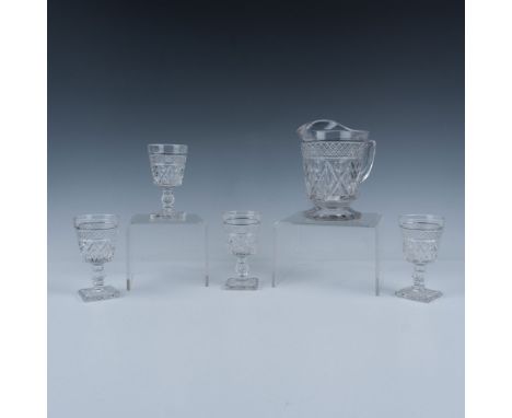 Vintage pressed glass beverage set featuring an elegant pitcher and four matching wine glasses. Each showcases a popular patt