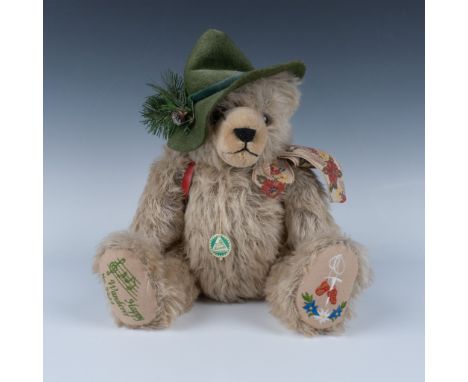 Adorable teddy bear representing Max Hermann made from mohair plush and firm polyester filling, with a small backpack. It pla