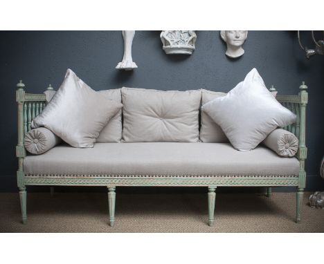 A SWEDISH GUSTAVIAN STYLE PAINTED WOOD SETTLEthe sofa with distressed, light green paint to surface, the baluster frame with 