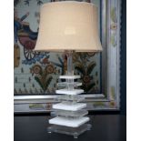 A GEOMETRIC PERSPEX LAMP WITH HESSIAN SHADE