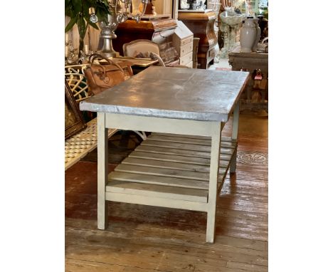 AN ENGLISH PAINTED WOOD AND ZINC-TOPPED CONSERVATORY TABLEof rustic style, green painted, the rectangular zinc covered top ov