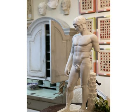 AFTER THE ANTIQUE: A PLASTER MODEL OF MARSthe standing nude god raised on a square integral base with palm tree behind,115cm 
