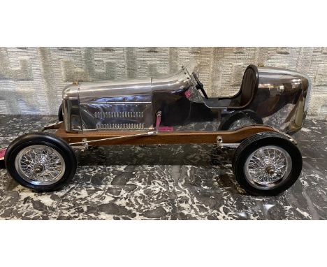 A MODEL OF A BANTAM RACING CARthe chrome and wood model with working steering wheel,&nbsp;49cm in length