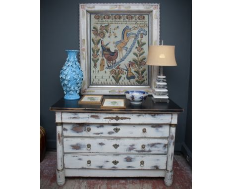 A 19TH CENTURY FRENCH PAINTED WOOD COMMODEthe chest of drawers later painted off-white, the black top over a frieze drawer fl
