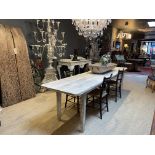 A SWEDISH PROVINCIAL ELM DINING TABLE